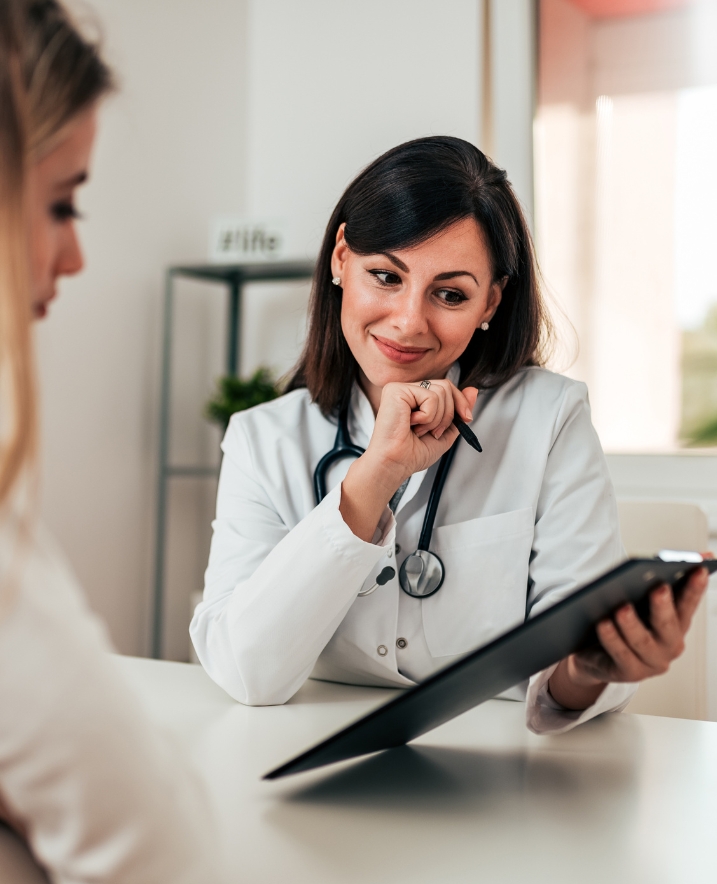 Doctor reviewing SensIQ treatment plan with patient